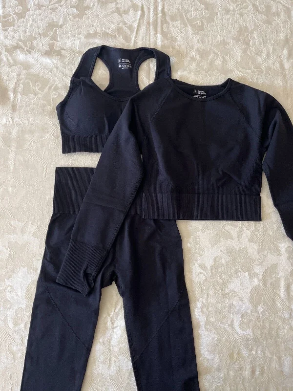 activewear set: bra, cropped compression top, and high waisted leggings